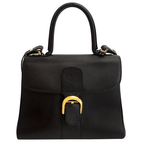 vintage delvaux handbags.